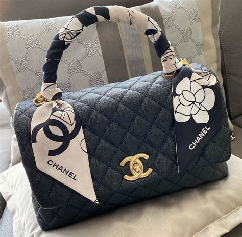 chanel small bag with handle.